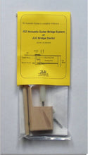 Load image into Gallery viewer, JLD Acoustic Guitar Bridge System kit with spruce pressure post and installation instructions in packaging
