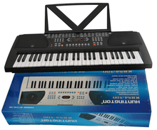 Load image into Gallery viewer, Huntington USA 54 Key electric keyboard with music rack and AC adaptor on product box

